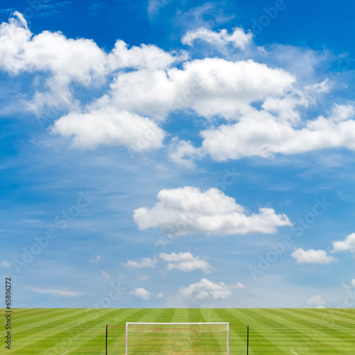 soccer field with blue sky background
