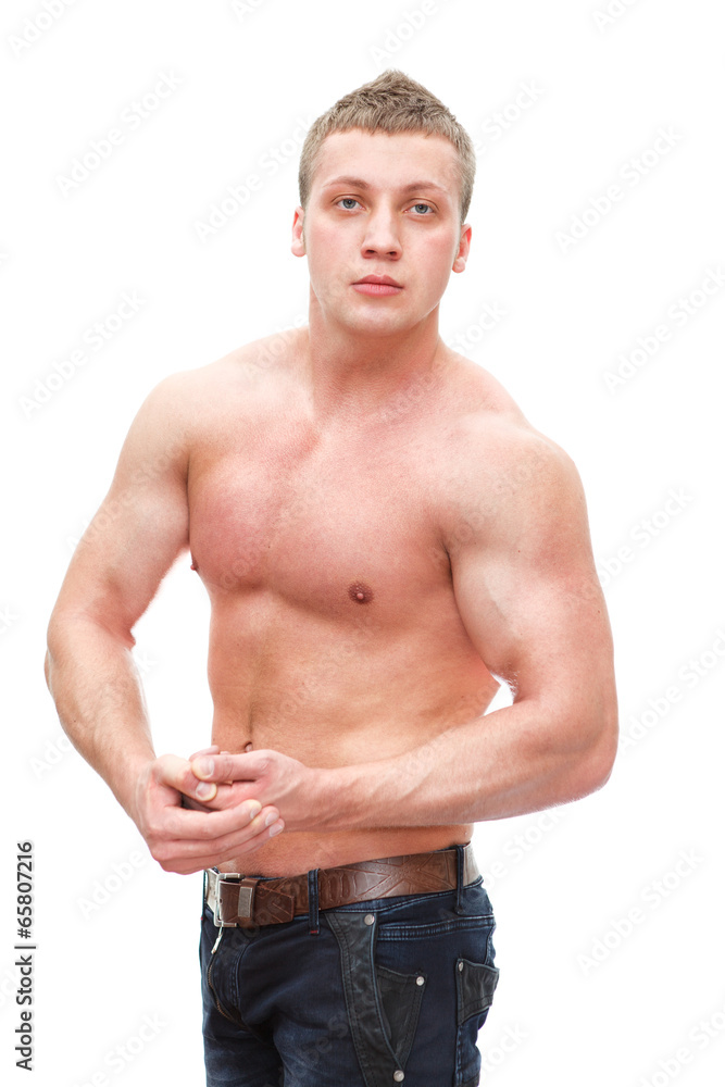 Muscular man with naked torso isolated on white background Muscular man with naked torso isolated on white background