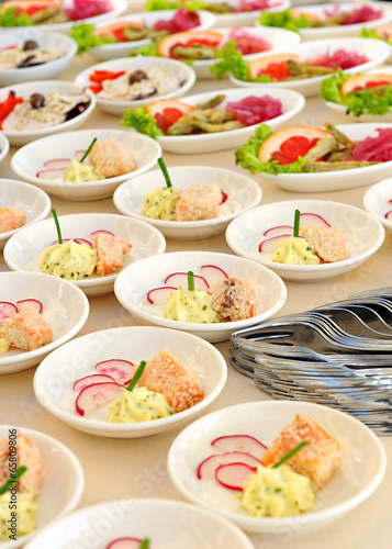 Assorted individual salads on a buffet