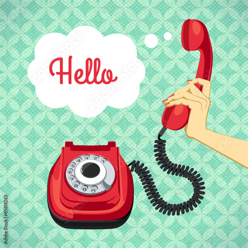 Hand holding old telephone