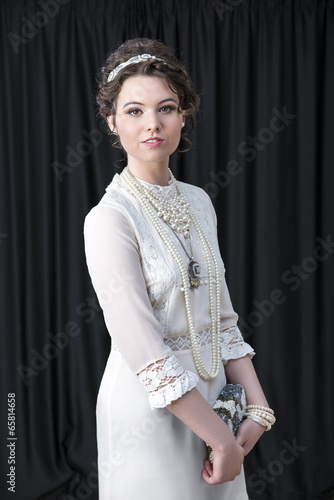Neo-Victorian model in white dress