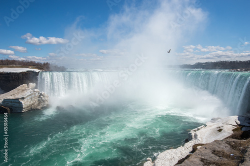 Niagara Falls - due to a cold winter ice remain in late April #65816464