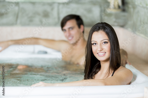 Young couple relaxing in th...