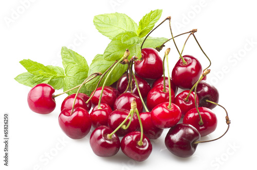Fresh Cherry and leaves of mint on the white