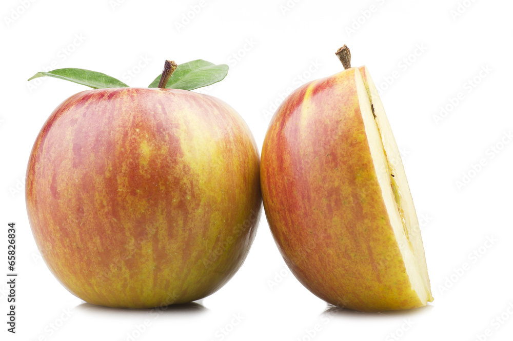 Red apple and leaves on the white Red apple and leaves on the white