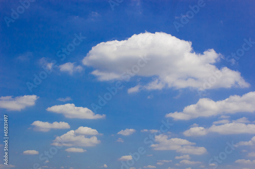 clouds in the sky drifting away in a light breeze