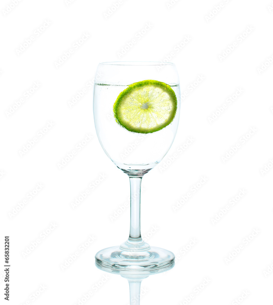 glass of cocktail with lime and mint isolated on white