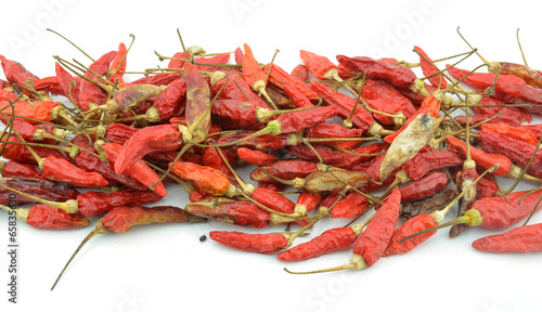 Dried chilli or chilli pepper isolated on white background cutou
