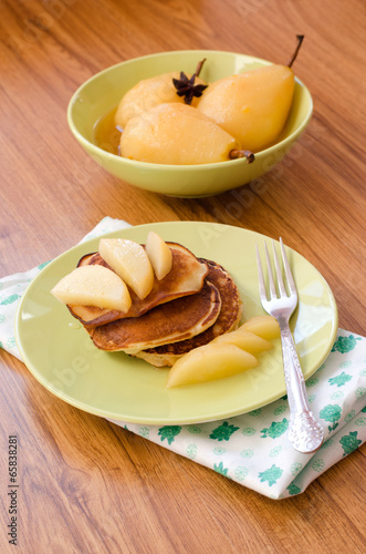 pear stewed in citrus juice and pancakes