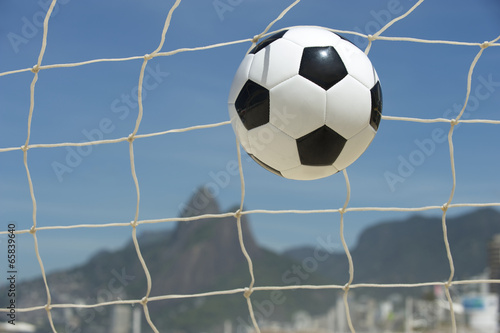 Soccer Goal Ball in Football Net Rio de Janeiro Brazil Beach © lazyllama