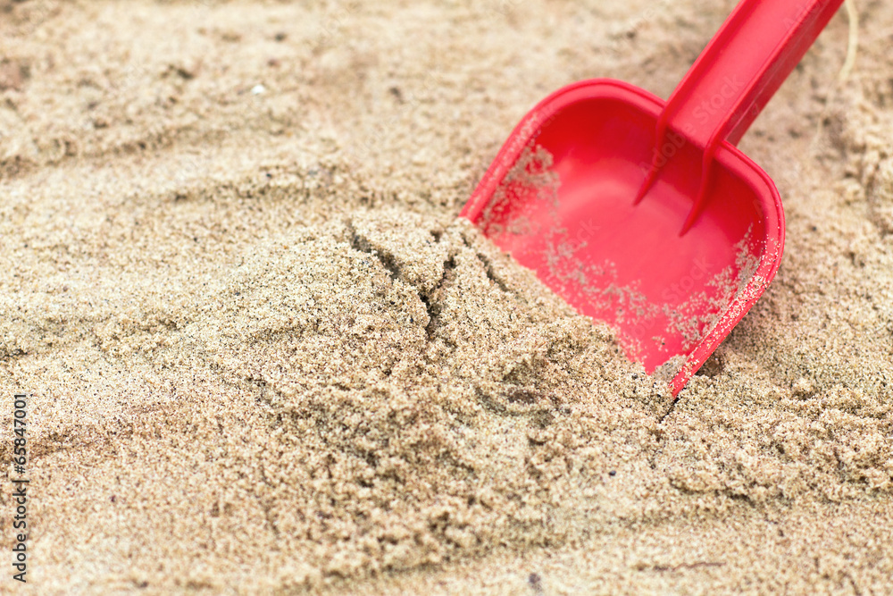 Children's shovel in the sandbox. Children's shovel in the sandbox.
