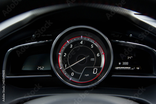 Close up of car dashboard and Odometer.