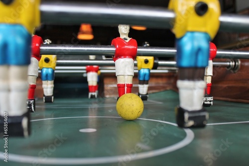 Foosball table football soccar in team colors Soccer Brazil shirts Tabletop table stock photo photograph picture image  photo