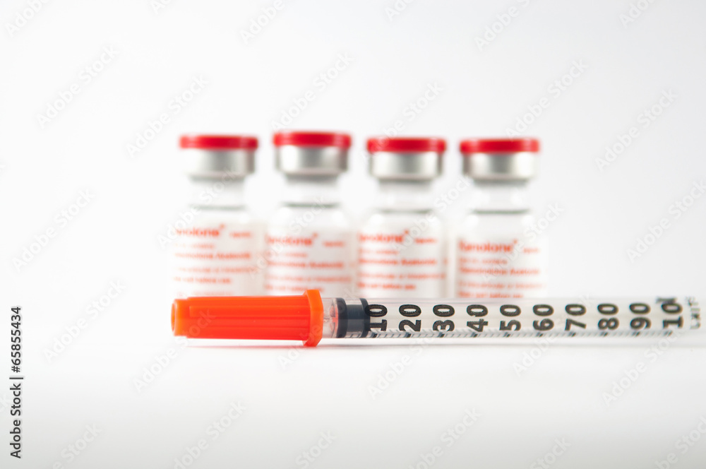 Disposable syringe and injection vials background Disposable syringe and injection vials background