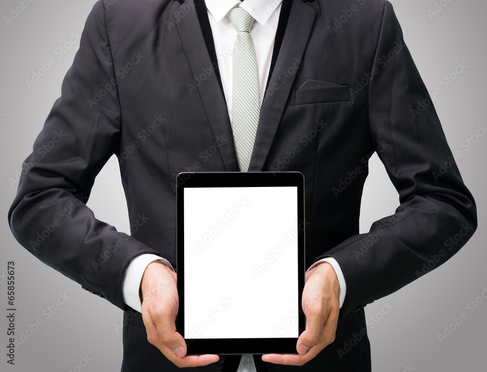 Businessman standing posture hand holding blank tablet isolated Businessman standing posture hand holding blank tablet isolated