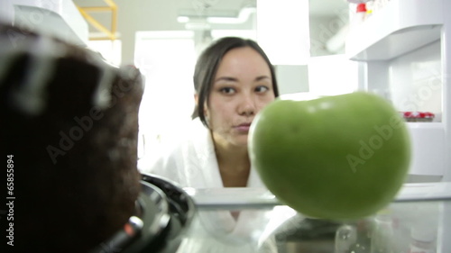 Asian girl in her kitchen