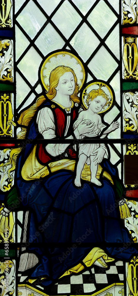 Obraz premium Mary holding Jesus in stained glass