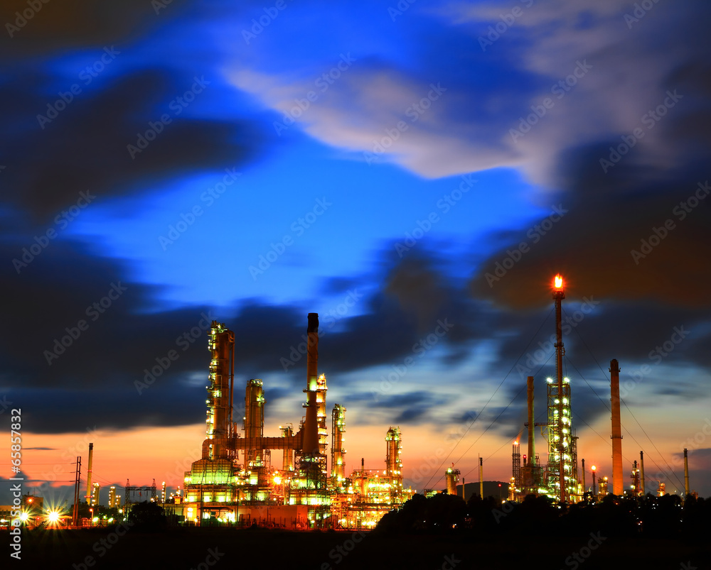 Petrochemical plant oil refinery at at twilight