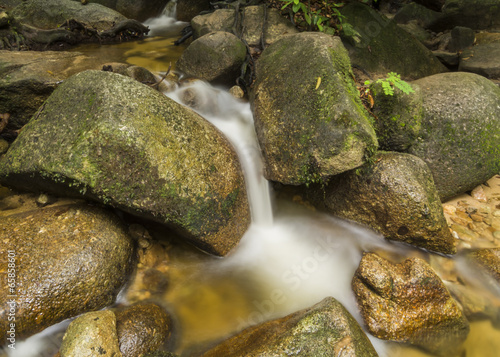 Small waterfall in tropical rainforest