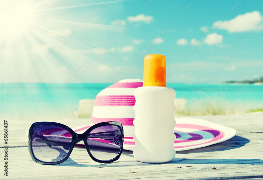 Sun lotion and sunglasses