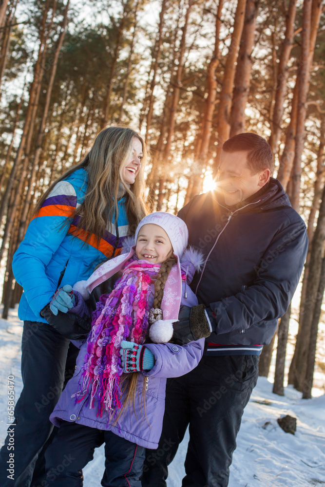 happy family in winter forest happy family in winter forest