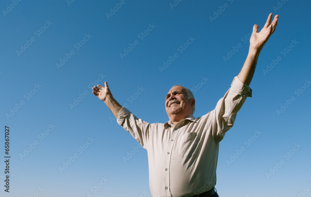 Senior retired man rejoicing in the sunshine Senior retired man rejoicing in the sunshine