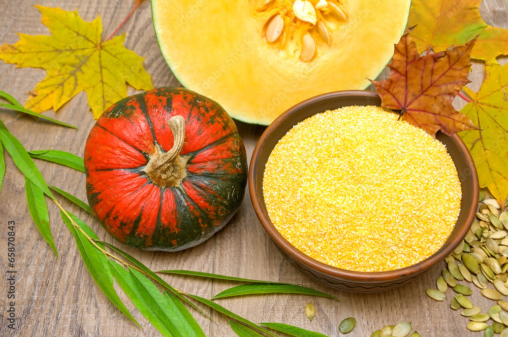 pumpkin and polenta in a bowl on a wooden background pumpkin and polenta in a bowl on a wooden background