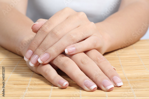 Fotografija Beautiful woman hands and nails with perfect french manicure