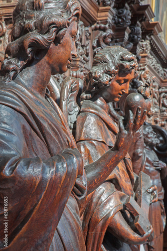 Antwerp - Statue of angel as symbol of cardinal virtous photo