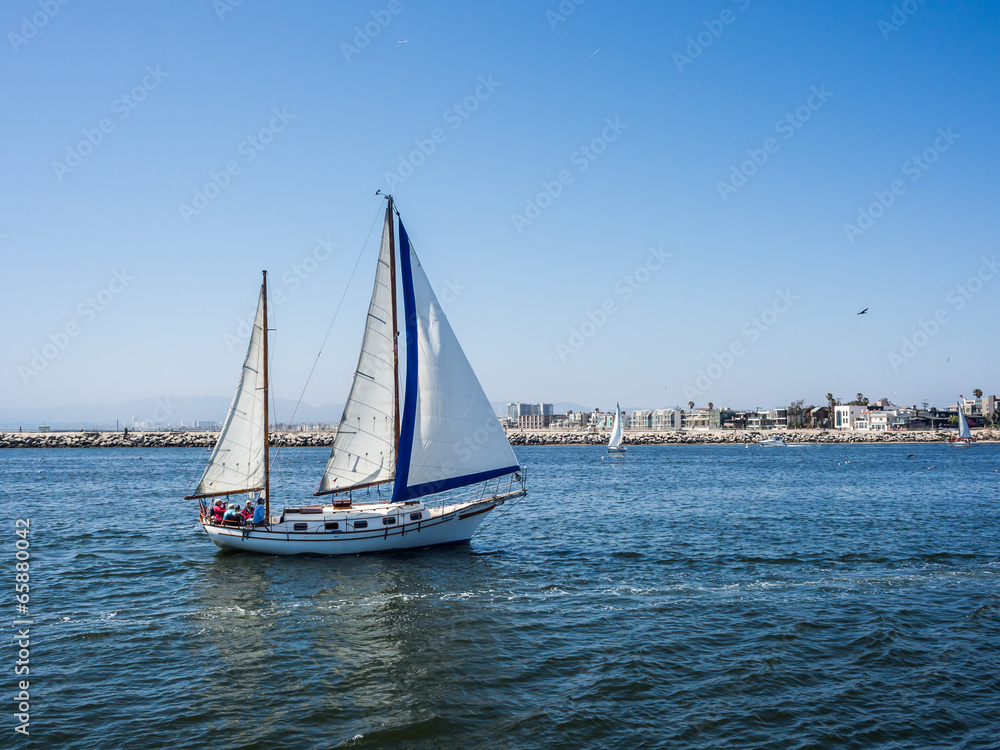 a sailboat sail back to the Marina Del Rey in CA, USA