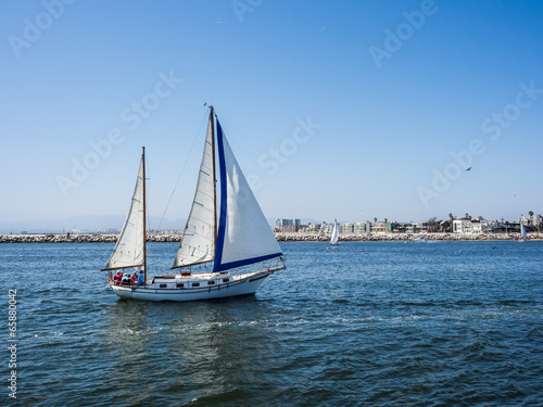 a sailboat sail back to the Marina Del Rey in CA, USA