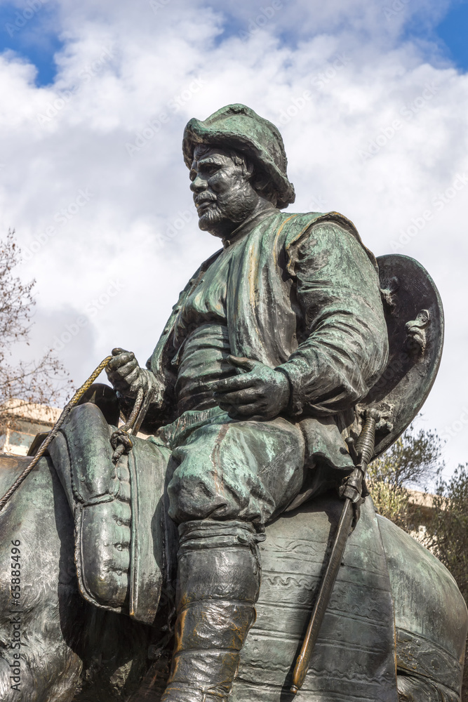 Naklejka premium Sancho Panza from monument to Cervantes and heroes of his books