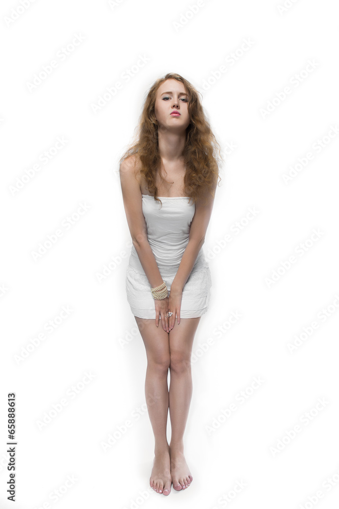 young woman with curly hair wearing white dress young woman with curly hair wearing white dress