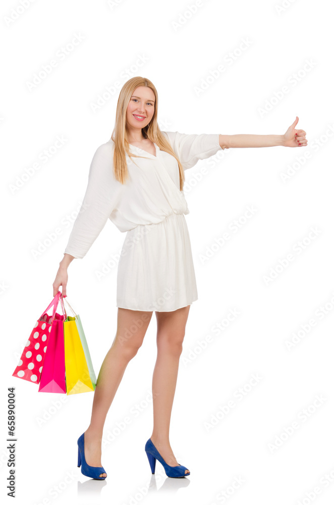 Woman with shopping bags isolated on white Woman with shopping bags isolated on white