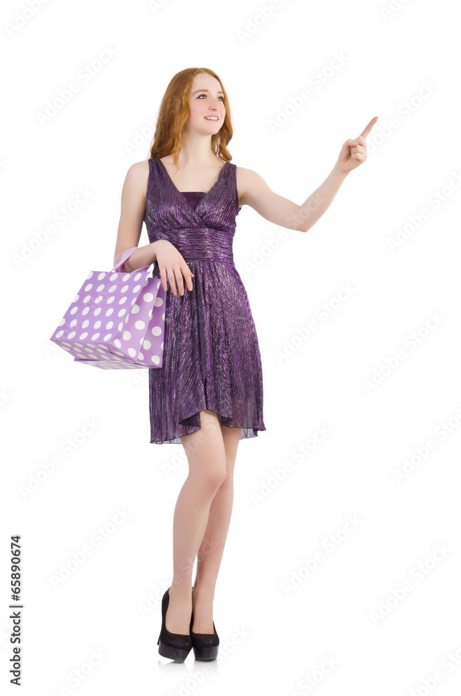 Woman with shopping bags isolated on white