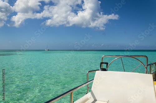 Fototapeta Naklejka Na Ścianę i Meble -  The view from white luxury catamaran in the azure water