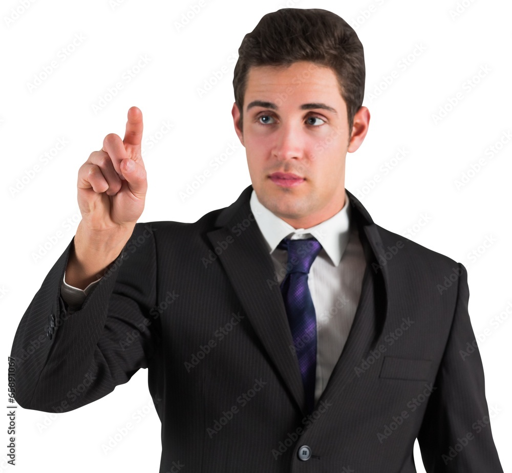 Young businessman standing and pointing Young businessman standing and pointing
