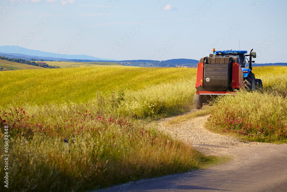tractor in the fields of Tuscany tractor in the fields of Tuscany