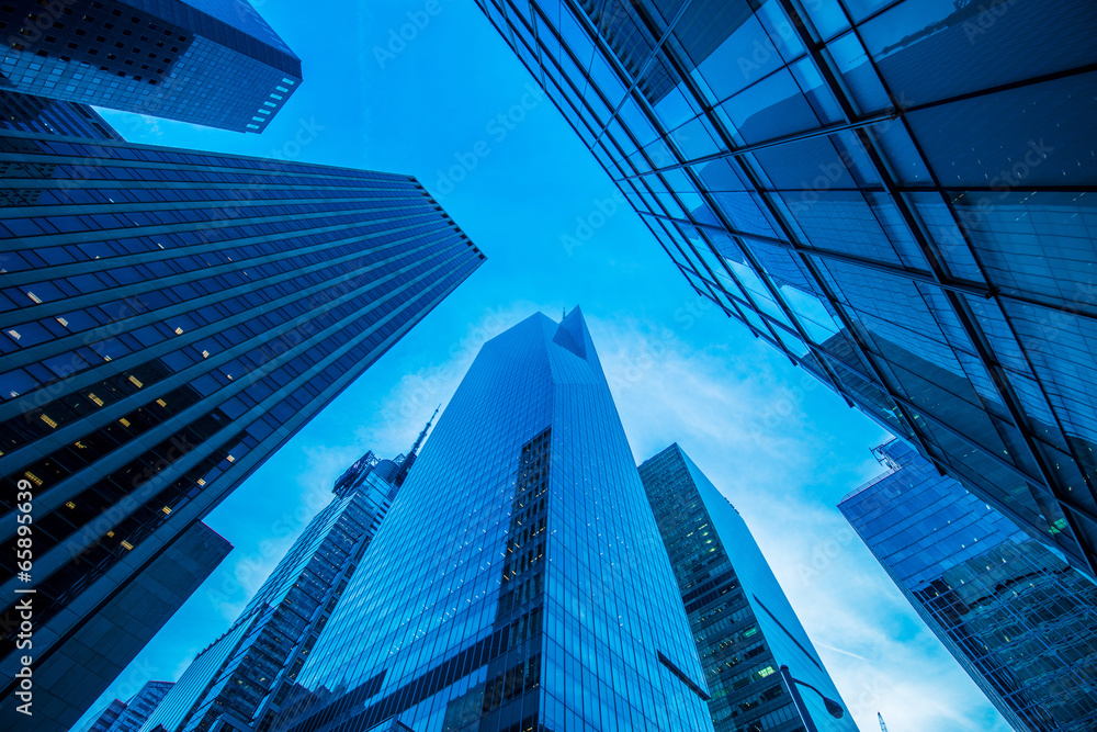 Fototapeta premium Tall skyscrapers during evening hours