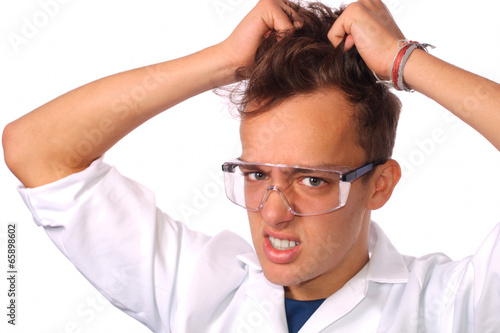 Foto Frustrated scientist pulling his hair