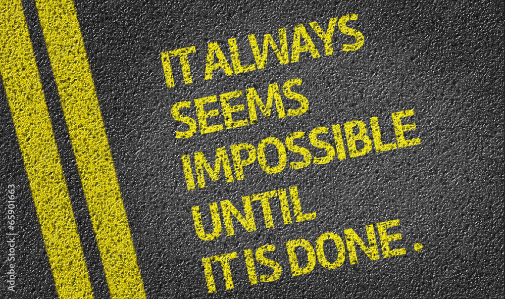 It Always Seems Impossible Until It Is Done written on the road
