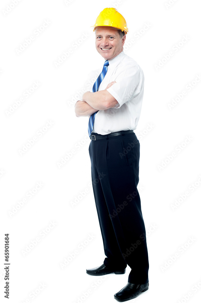 Smiling engineer against white background Smiling engineer against white background