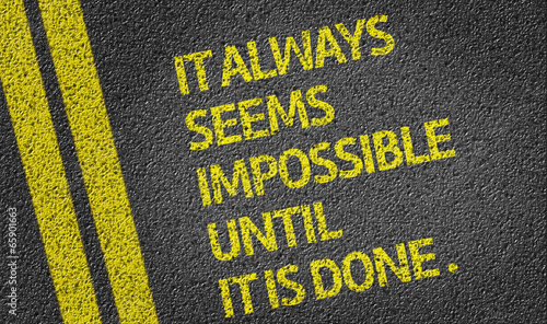 It Always Seems Impossible Until It Is Done written on the road
