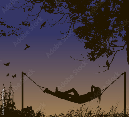 Relaxing woman lying in hammock under trees.
