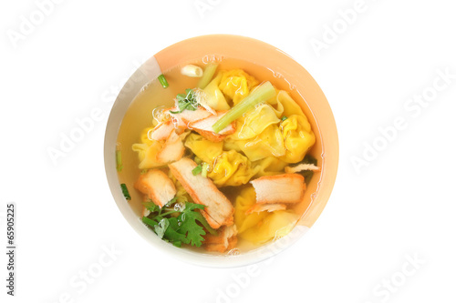 Wonton noodles soup in bowl of isolated.