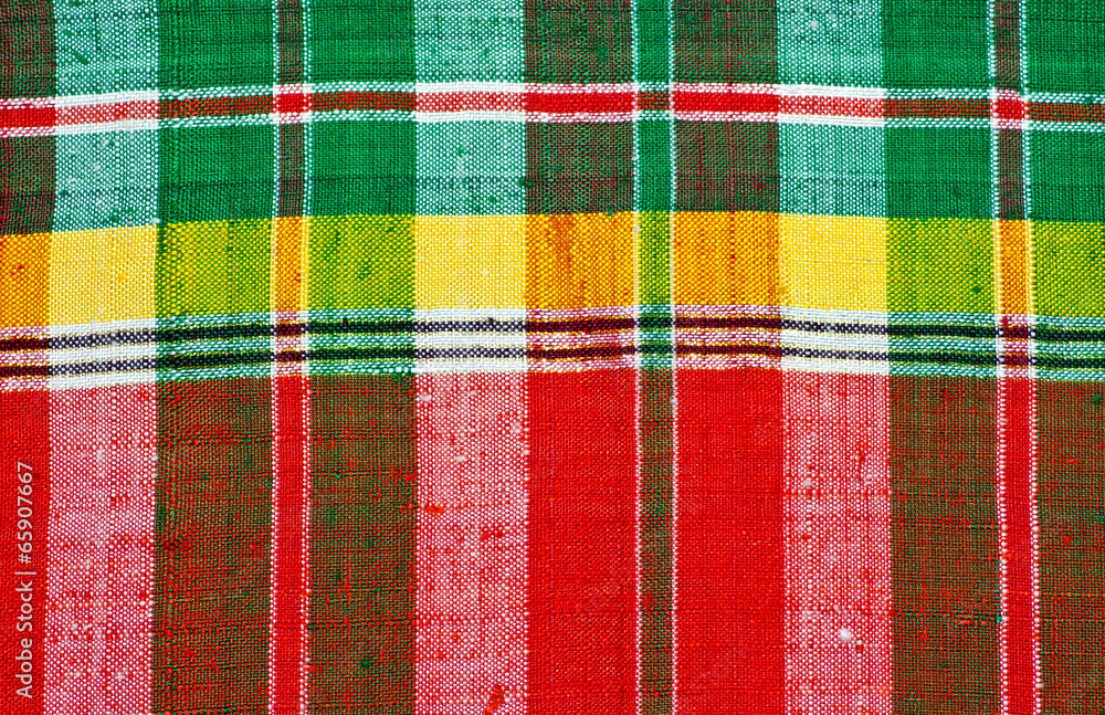 Colorful checkered loincloth fabric background Colorful checkered loincloth fabric background