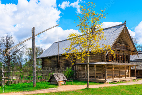 wells near the wooden Russian house
