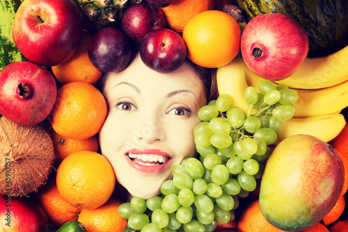 Woman face in fruits