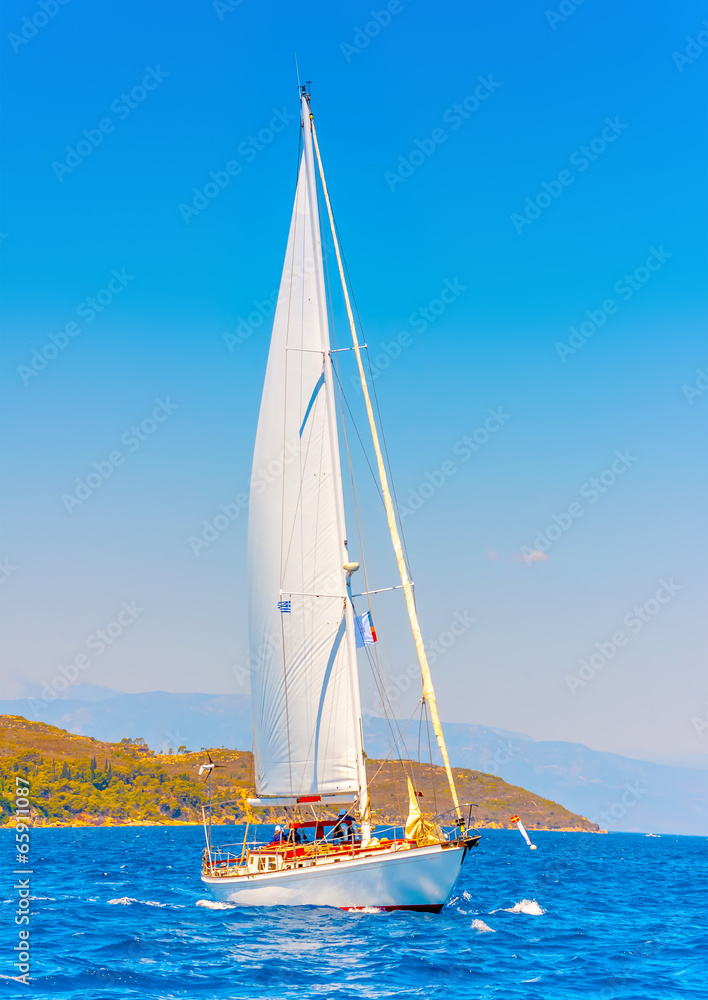 Fototapeta premium Classic wooden racing sailing boat in Spetses island in Greece