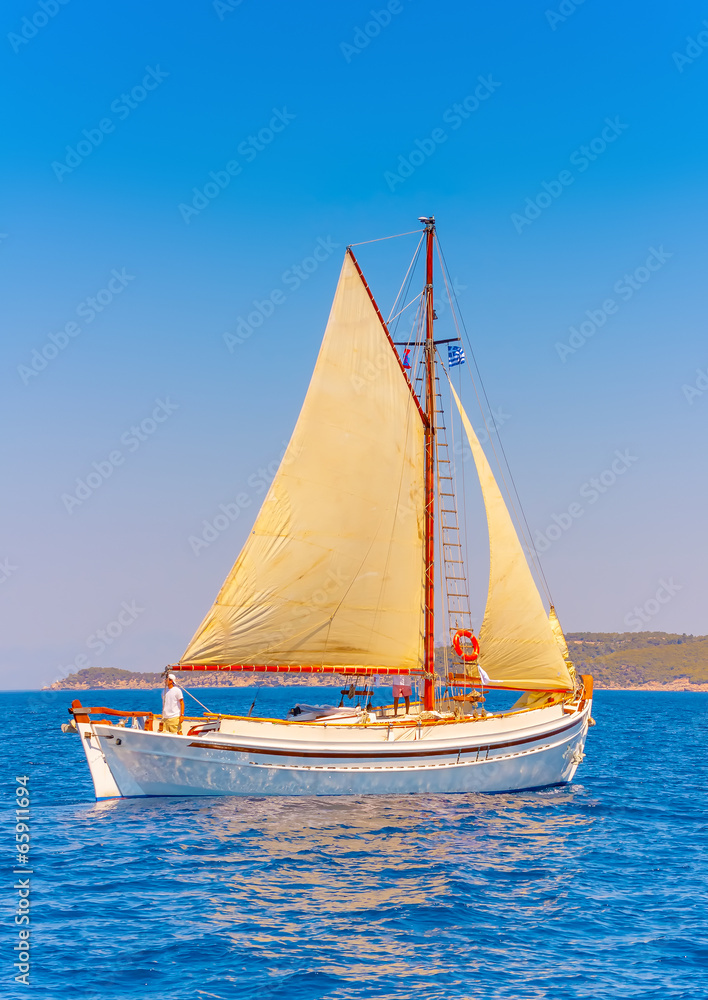 Fototapeta premium Classic wooden Greek boat (Kaiki) in Spetses island in Greece